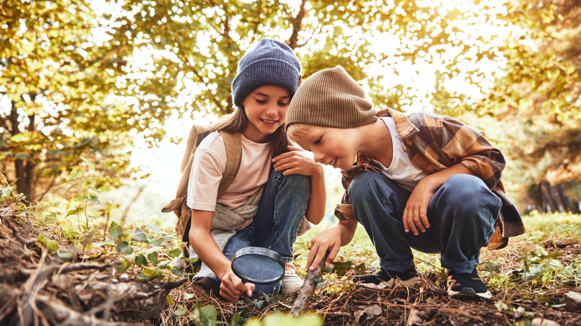 children examining nature